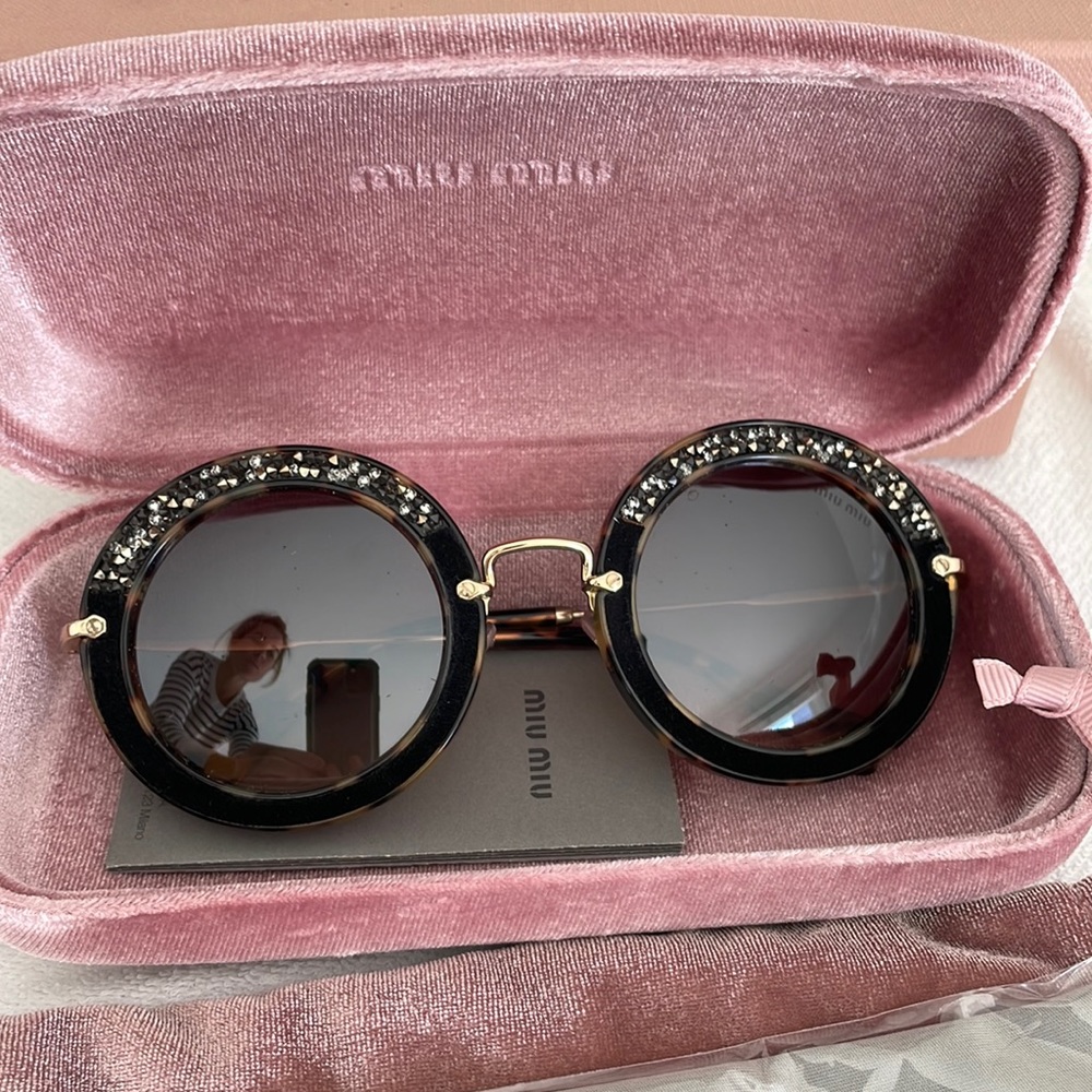 MiuMiu round derailed sunglasses